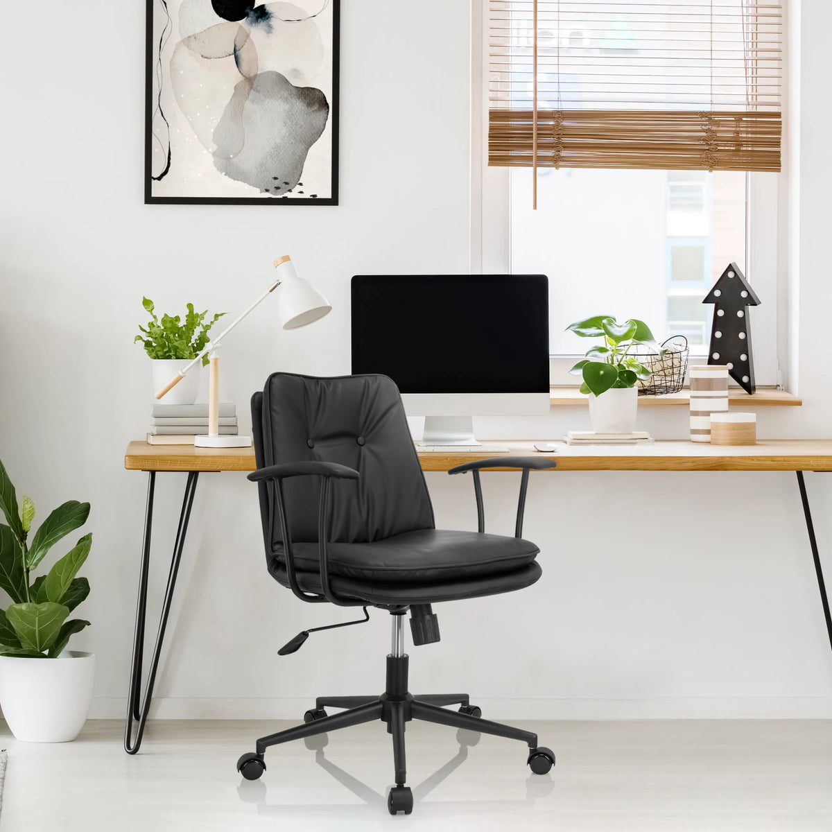 Black Home Office Chair SMALLO with armrests and castors at a desk by hjh OFFICE