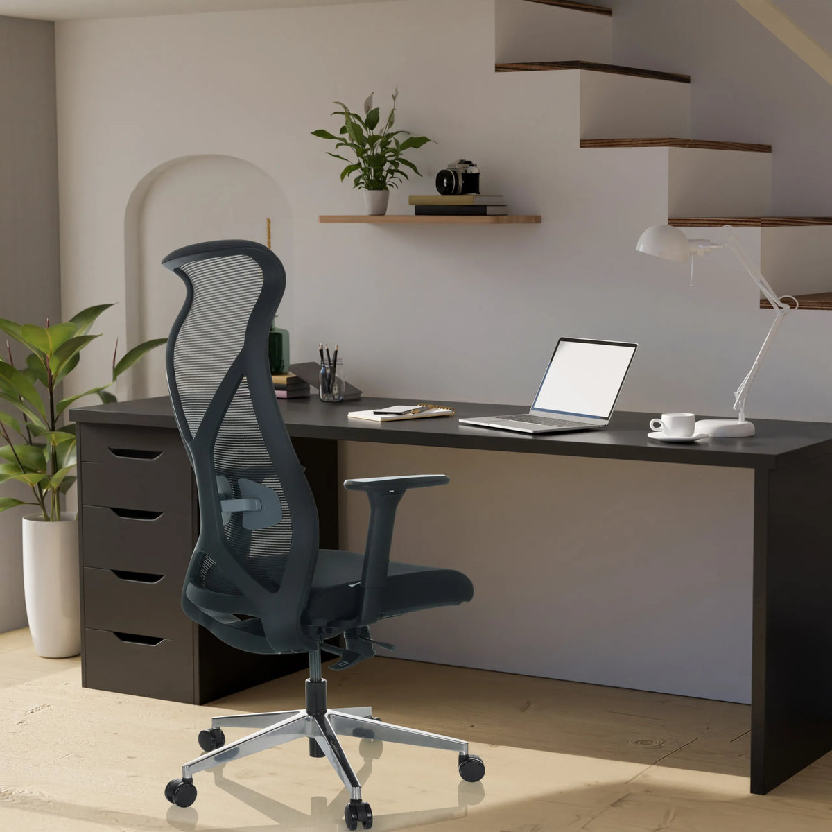 Black Professional Office Chair AZURRO B with mesh backrest and armrests in front of a desk by hjh OFFICE