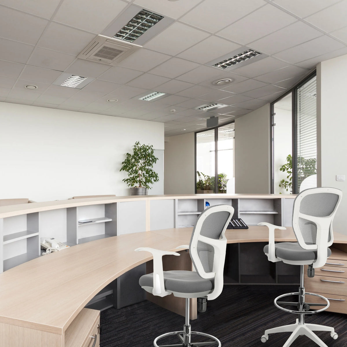 Two grey Counter chairs TOP WORK 108 W with white frames and armrests at a reception desk by hjh OFFICE