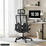 Black Professional Office Chair ARCEO B with mesh back and headrest at a desk in a home office by hjh OFFICE