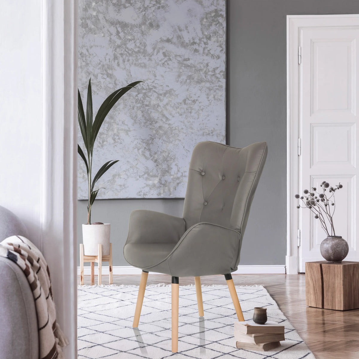 Grey upholstered armchair HAVENIO I with button tufting and four light wood legs by hjh LIVING
