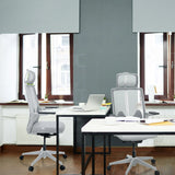 Two grey Professional Office Chairs ARCEO W at white desks in an office by hjh OFFICE