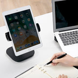 Black Mobile phone & tablet holder FLEXMOBI IV with an inserted tablet on a white desk by hjh OFFICE