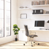 Artificial plant SCHEFFLERA in green in a black pot next to a desk by hjh OFFICE