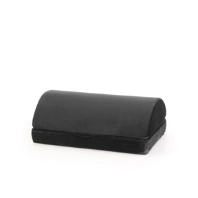 Black Footrest Podi Velvet 1 with a padded, semi-circular surface by hjh OFFICE